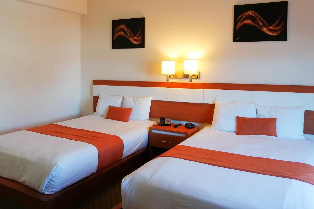 Capital O Hotel Herederos, Piedras Negras 外观 照片